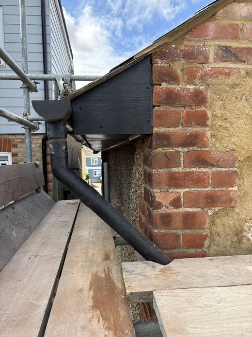 Roof edge stripped and renewed — after